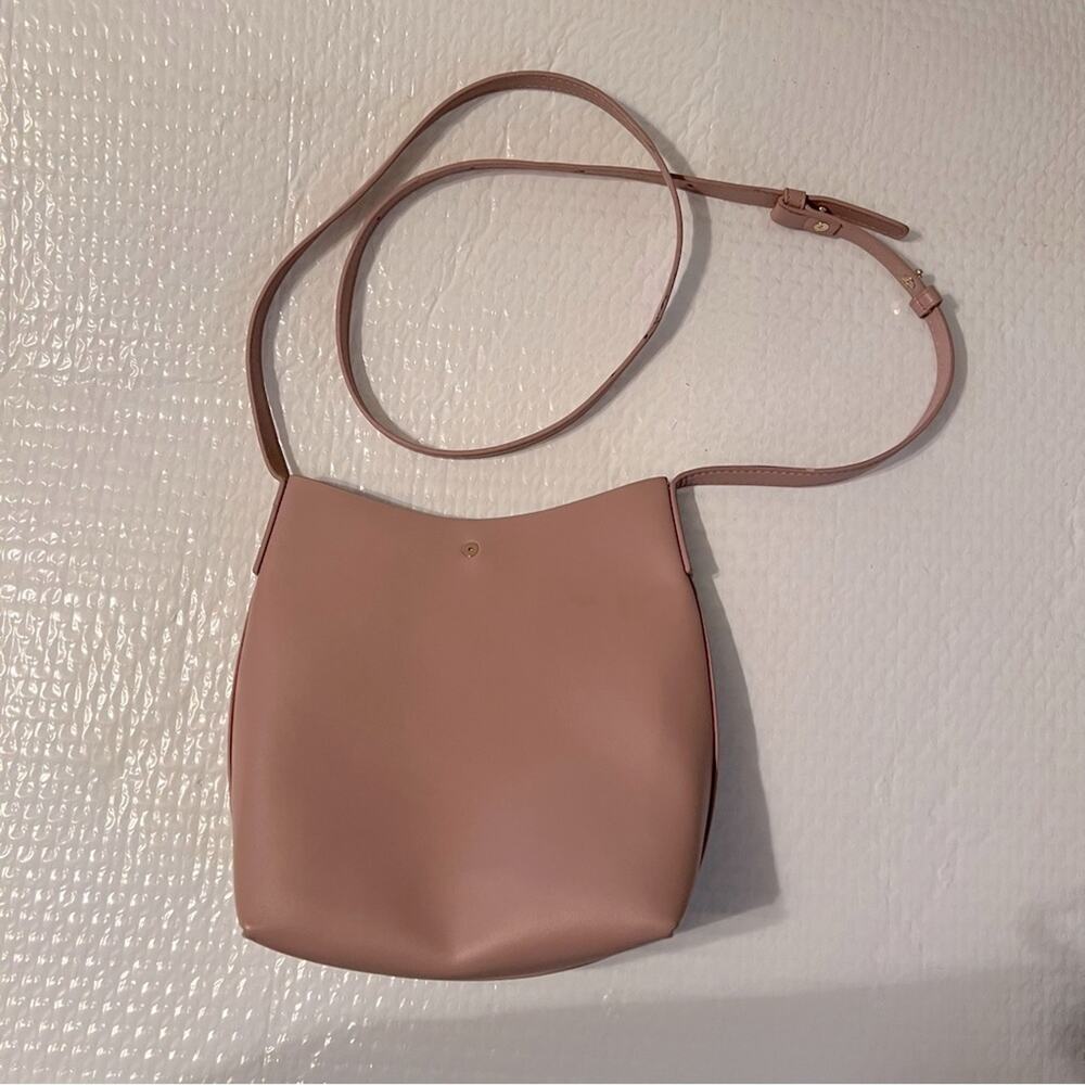 Samara crossbody purse.  Adjustable straps.  Snap close.